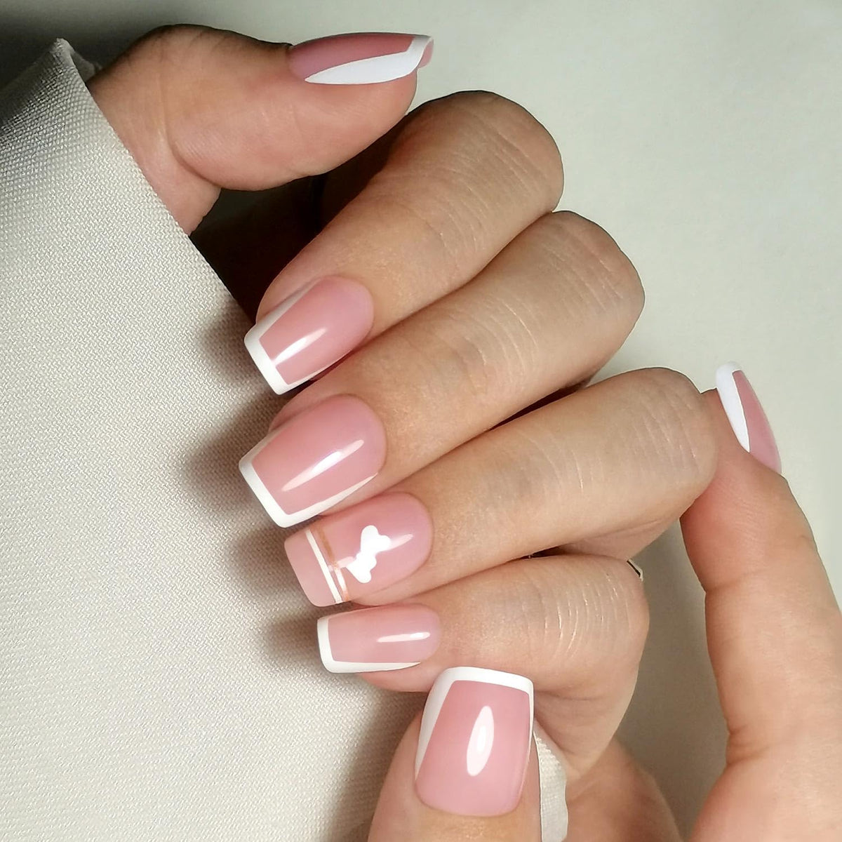 CurvLife French Tip Press On Nails displayed with double-sided nail file and cuticle stick