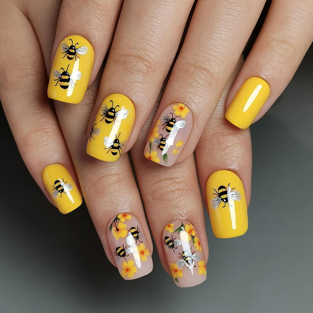 CurvLife Press On Nails Bee Garden applied on model's hands