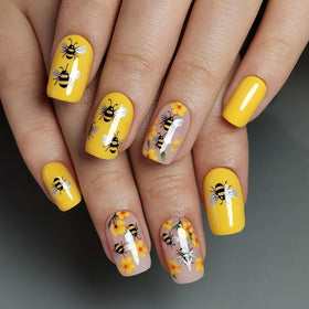 CurvLife Press On Nails Bee Garden applied on model's hands