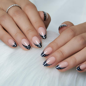 CurvLife press on nails showing glossy finish and polka dots