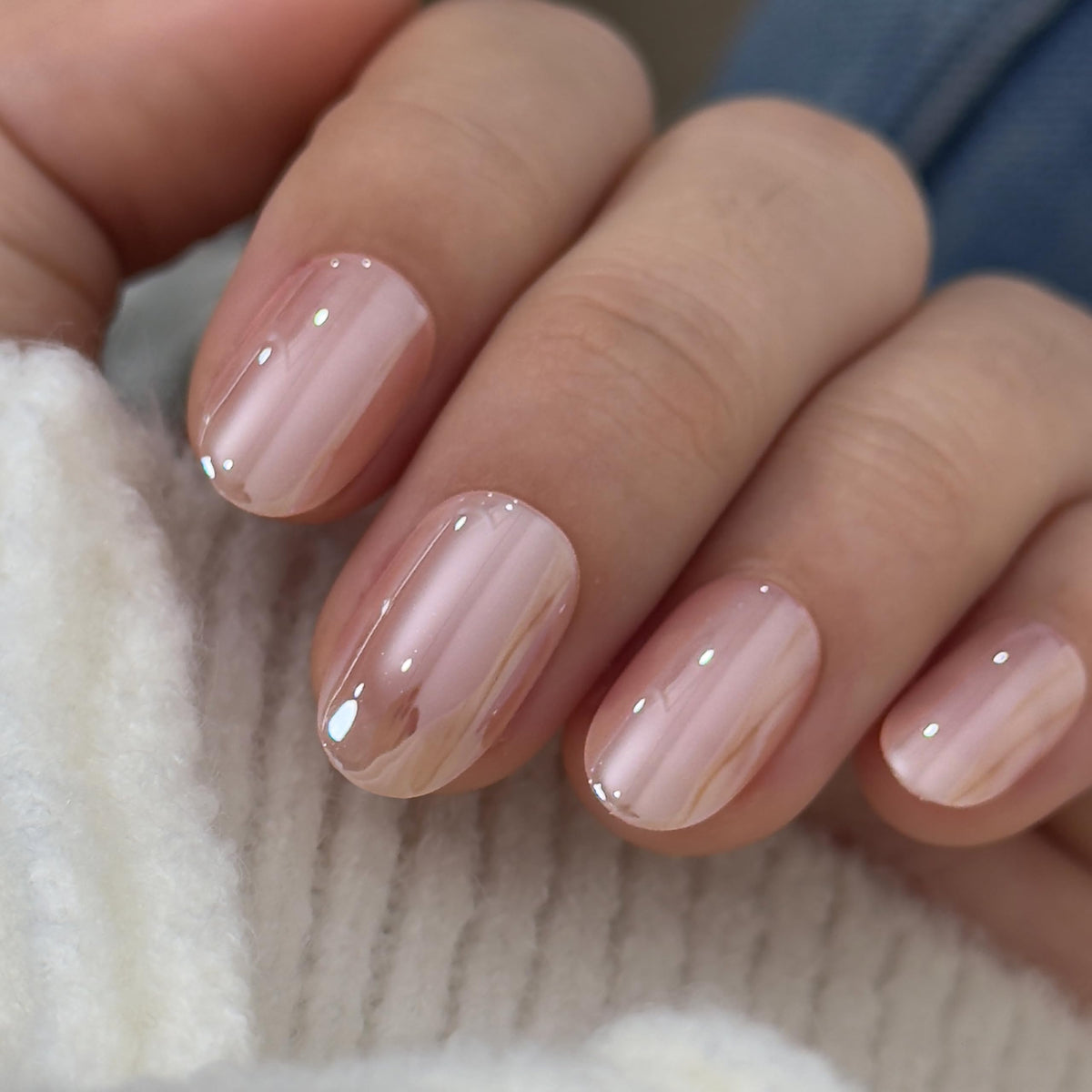 CurvLife Short Oval Press On Nails in various sizes laid out