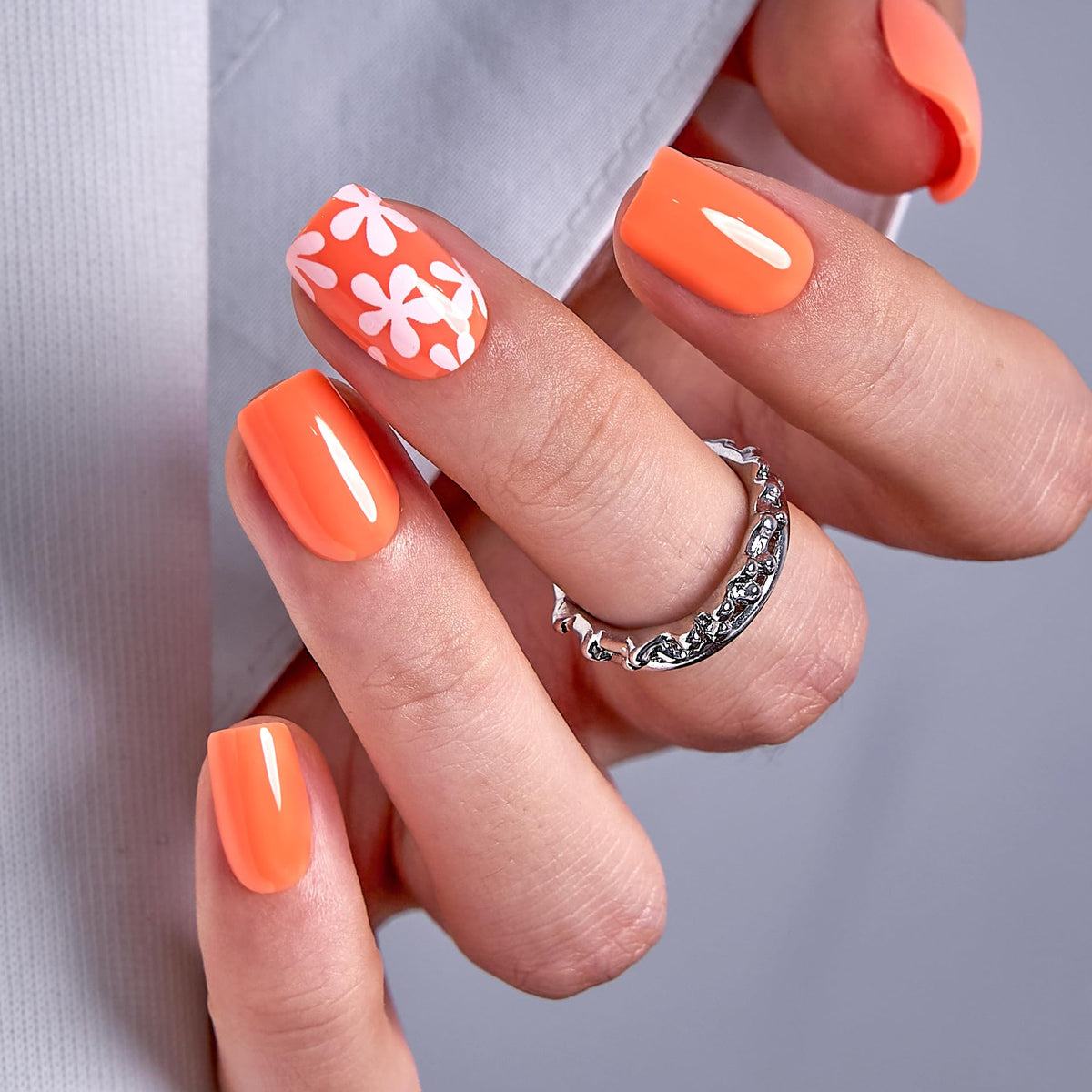 CurvLife Short Square Floral Press On Nails in orange and white front view