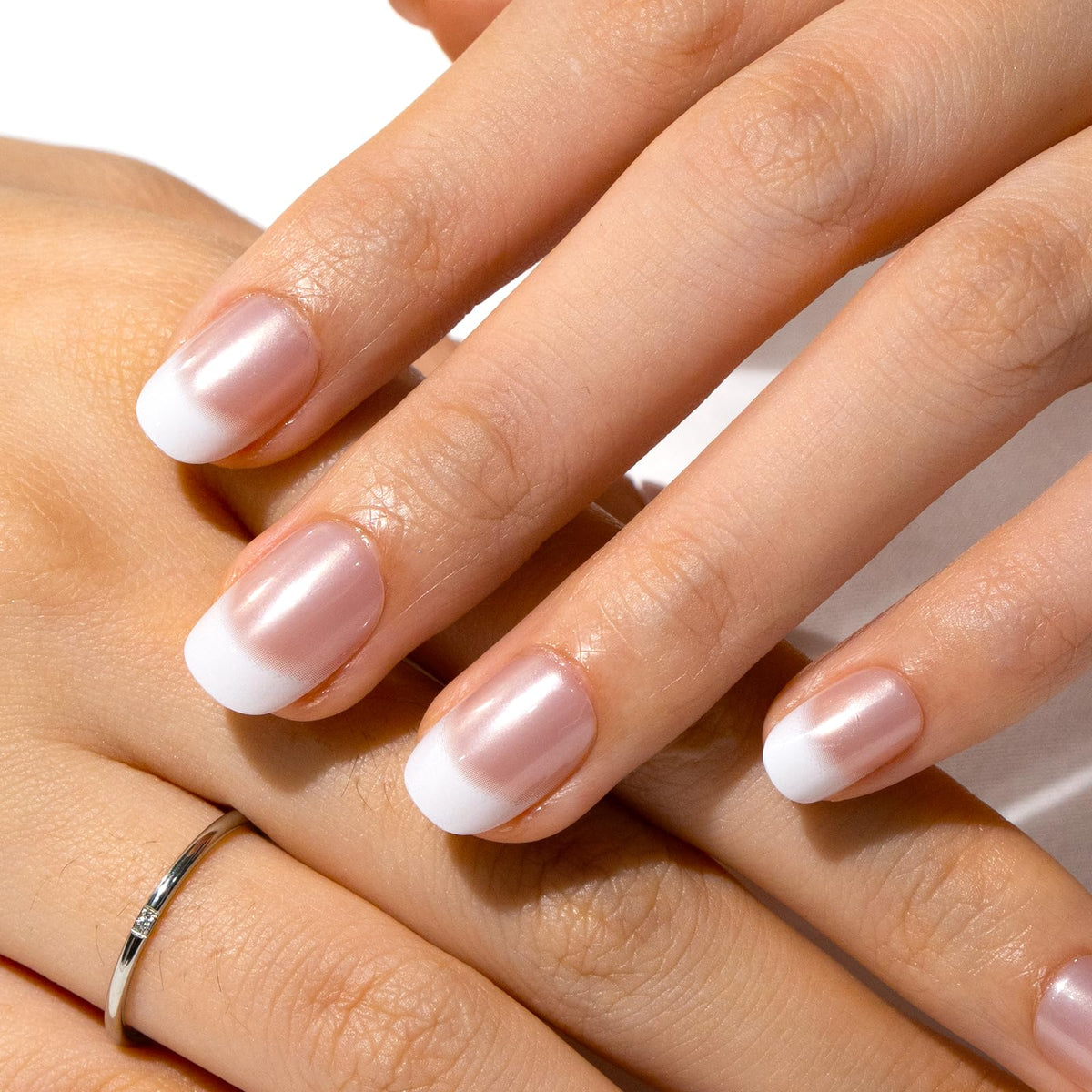 CurvLife Short Square French Tip Press On Nails displayed with cuticle stick and prep pad