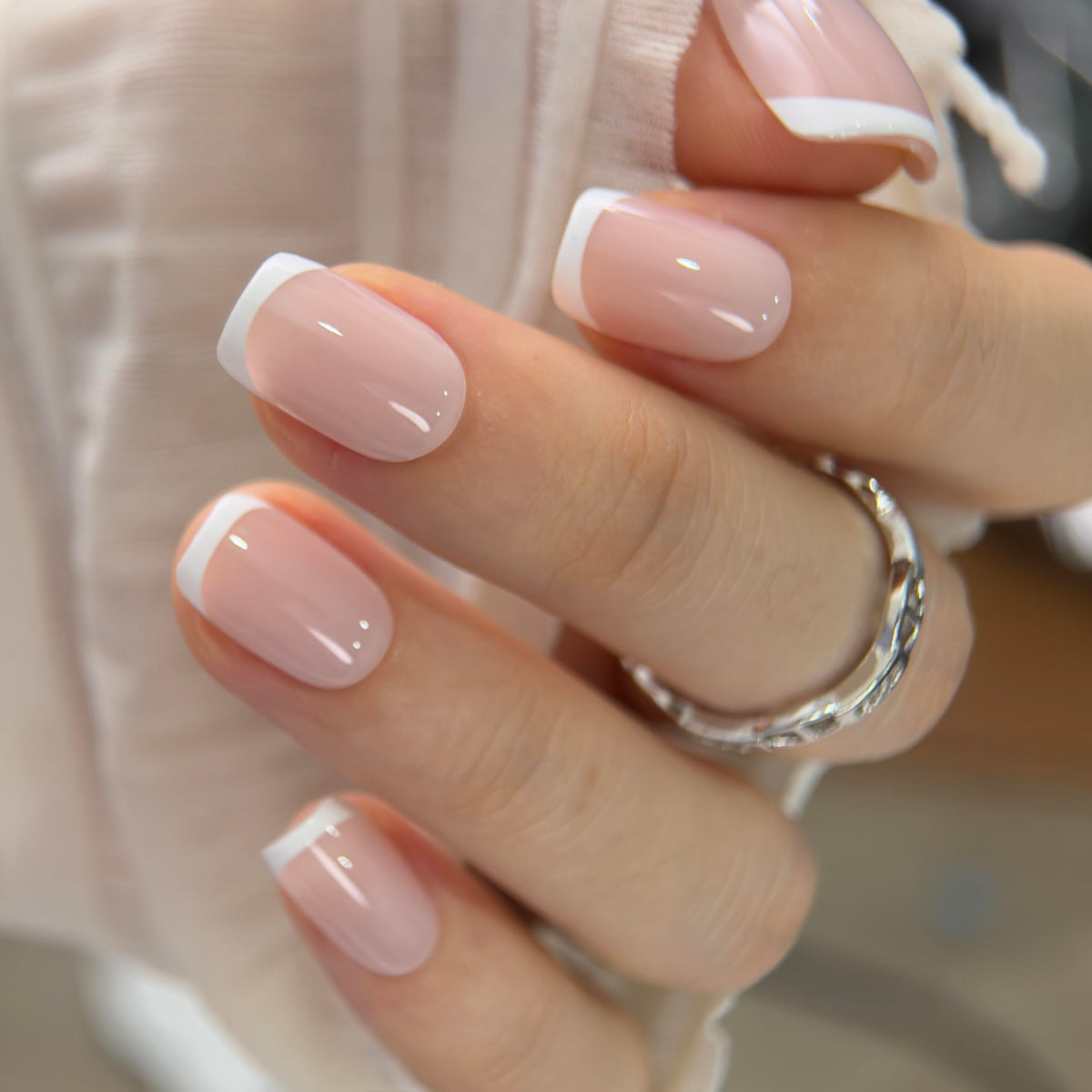 CurvLife Short Square French Tip Press On Nails displayed with nail file