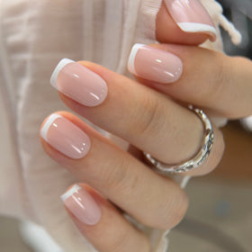 CurvLife Short Square French Tip Press On Nails displayed with nail file