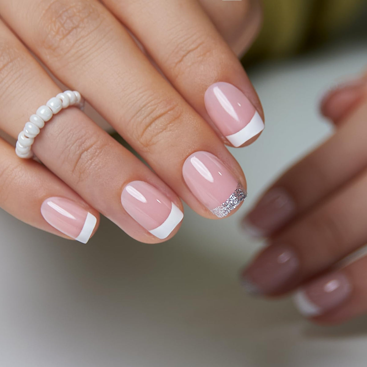 CurvLife Short Square French Tip Press On Nails in Glitter Pink packaging