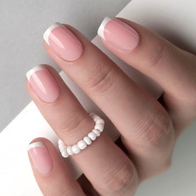 CurvLife Short Square French Tip Press On Nails in storage box