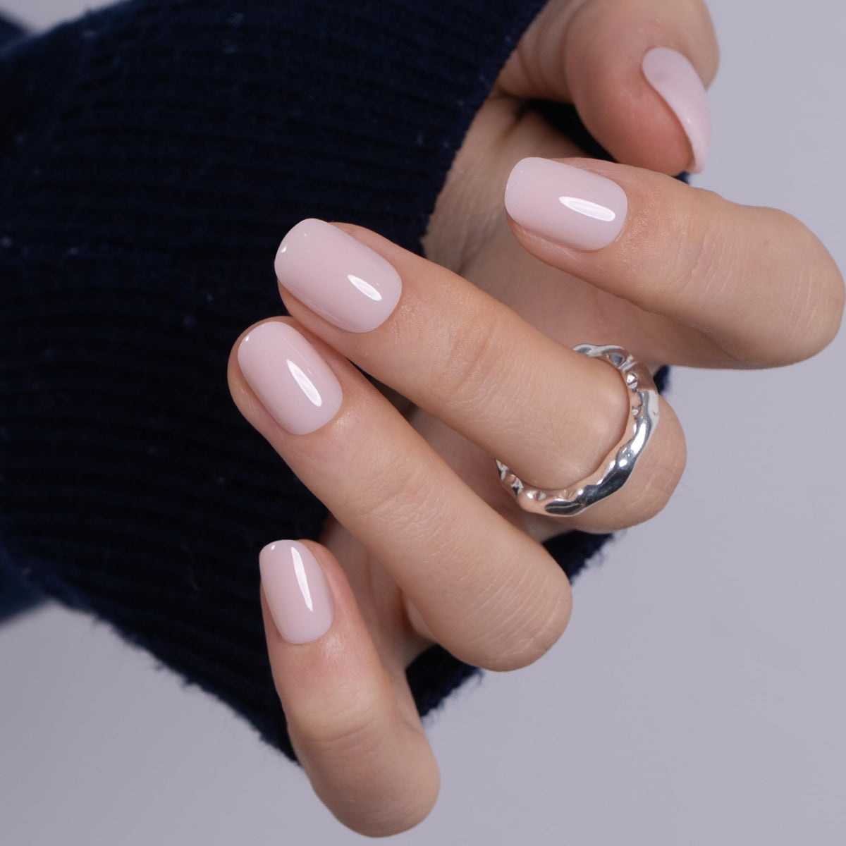 CurvLife Short Square Press On Nails applied on hands