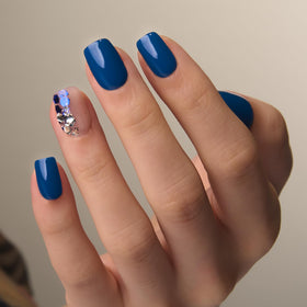 CurvLife Short Square Press On Nails displayed with cuticle stick
