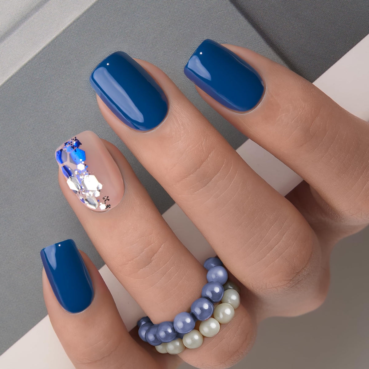 CurvLife Short Square Press On Nails in deep blue, front view