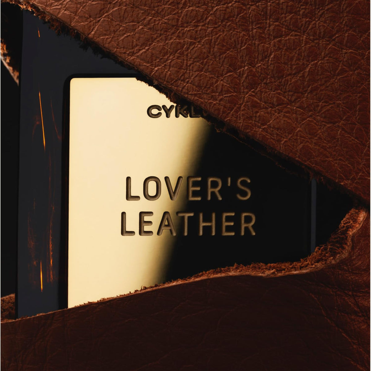 CYKLAR Perfume Oil bottle with leather texture background