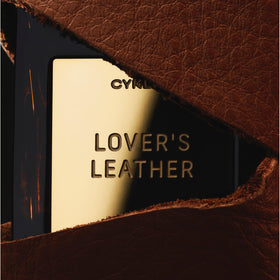 CYKLAR Perfume Oil bottle with leather texture background