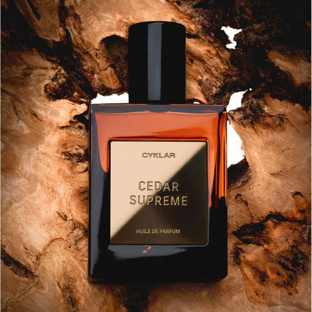 CYKLAR Perfume Oil Cedar Scent 15ml bottle with floral background