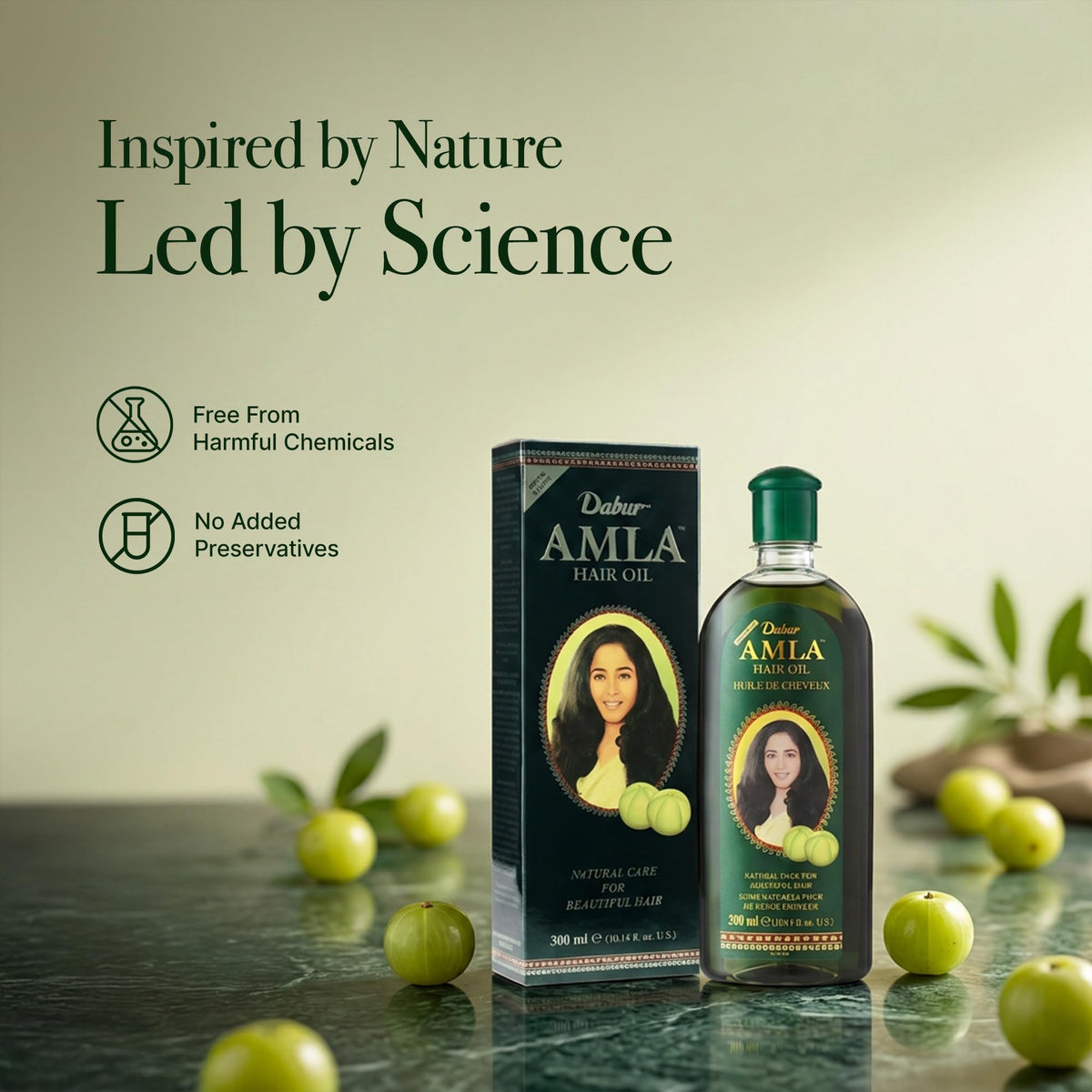 Dabur Amla Hair Oil with natural ingredients background