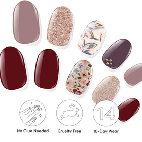 Dashing Diva Alpine Retreat nail strips in use on manicured nails