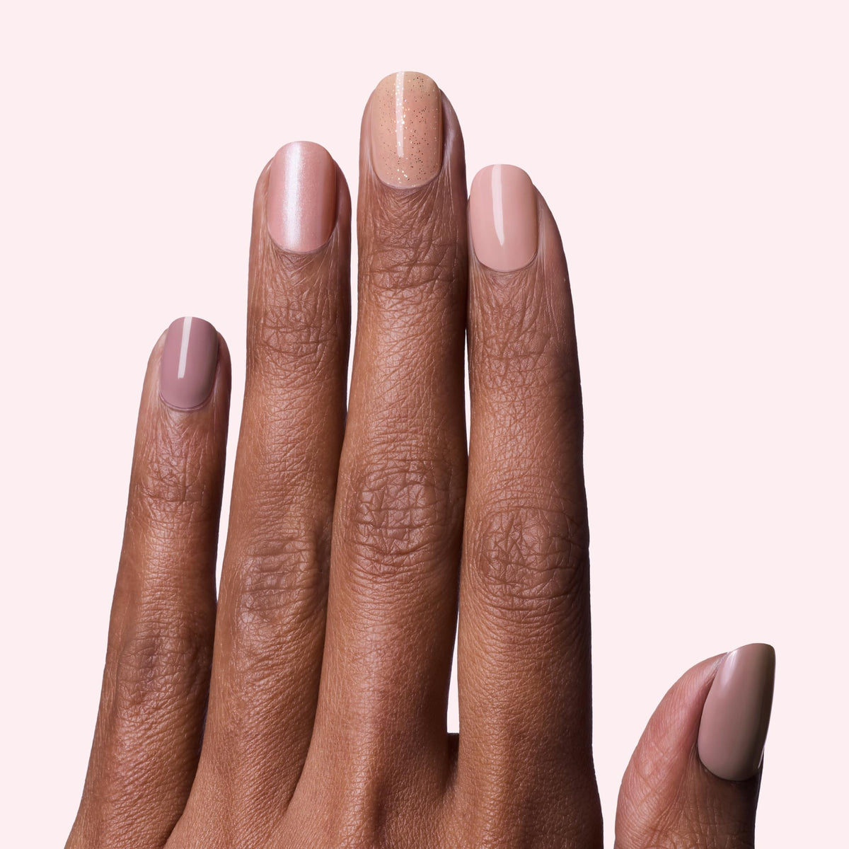 Dashing Diva nail strips showing various nude designs