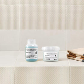 Davines MINU conditioner bottle with label