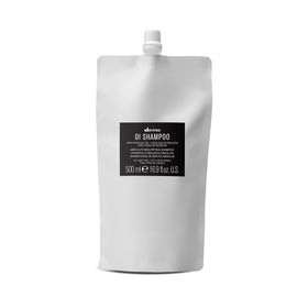 Davines OI Shampoo 549g front view with creamy texture