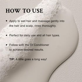 Davines OI Shampoo 549g with a soft lather on hair
