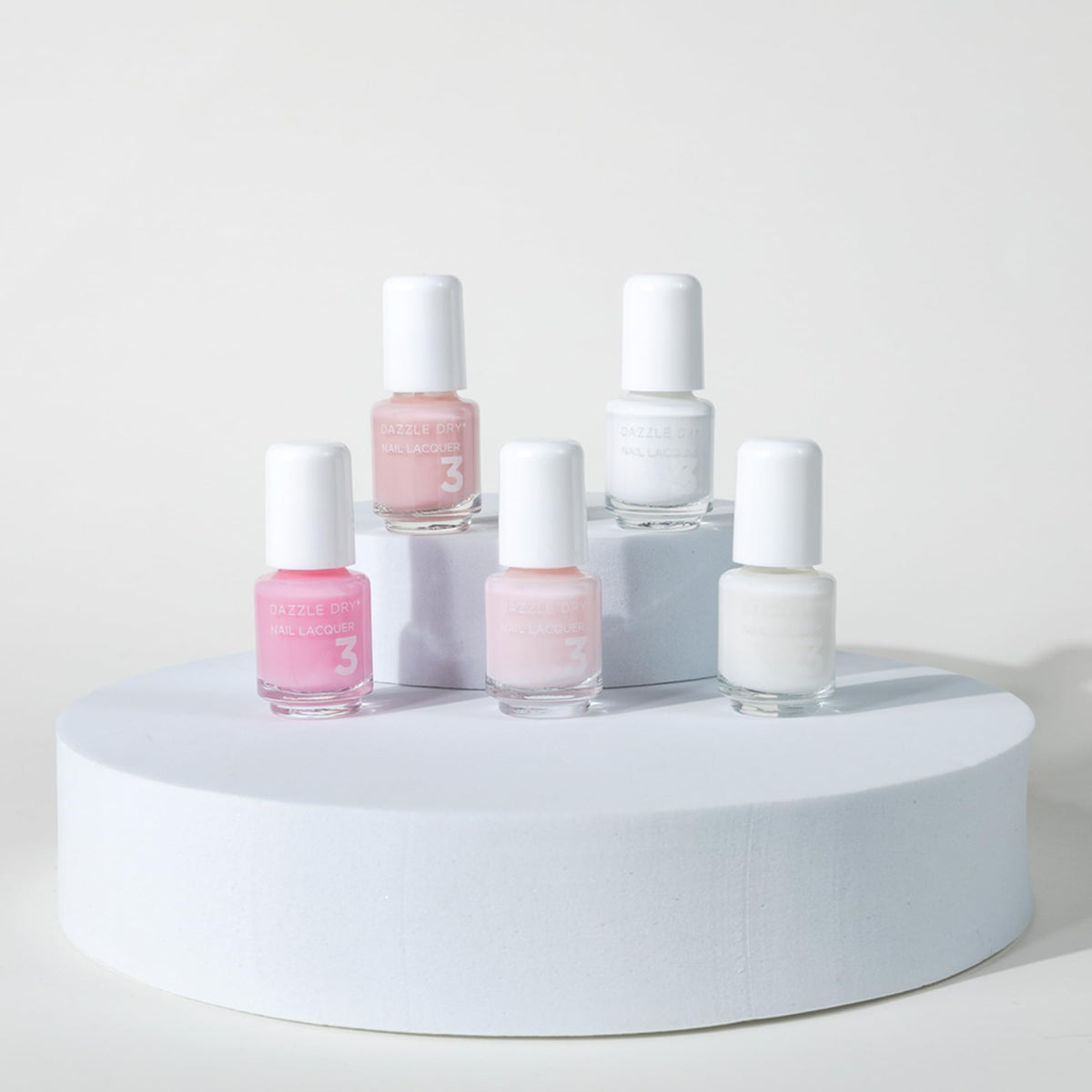 Dazzle Dry lacquer in Pinkies Up, pale pink with cool undertones