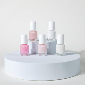 Dazzle Dry lacquer in Pinkies Up, pale pink with cool undertones