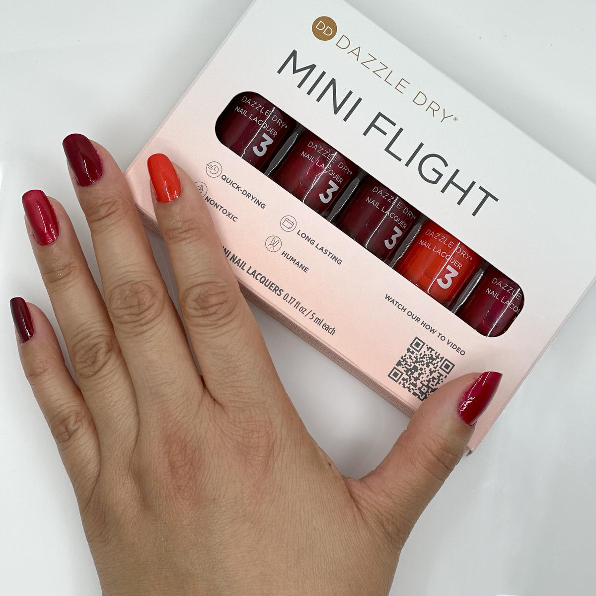 Dazzle Dry Mini Flight orangey red lacquer front view