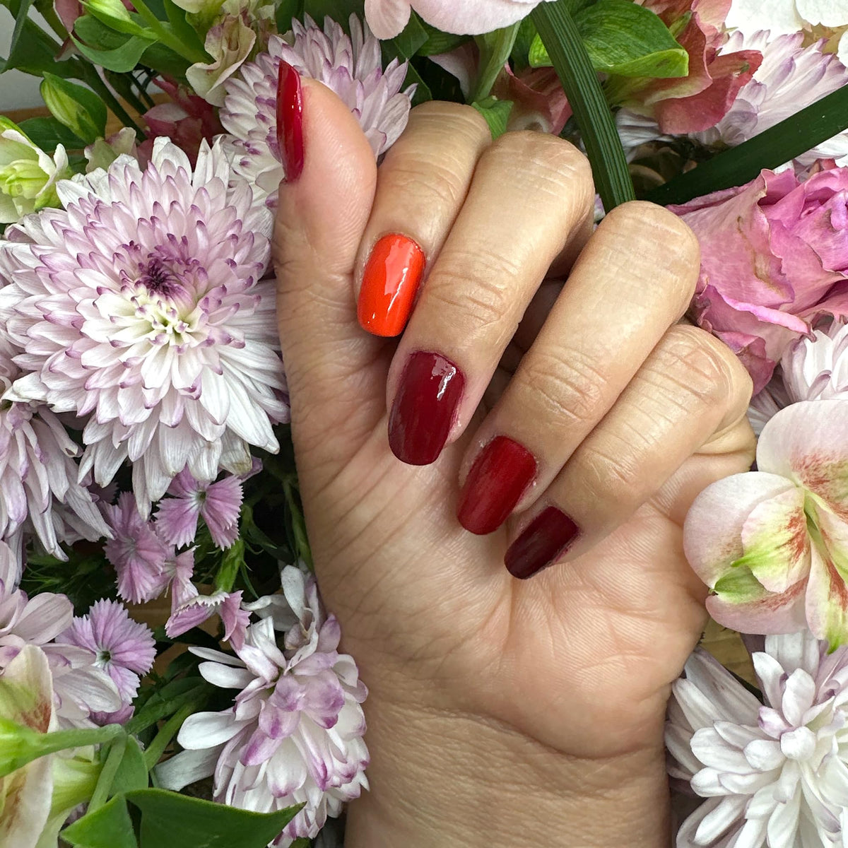 Dazzle Dry Mini Flight red with magenta shimmer lacquer close-up