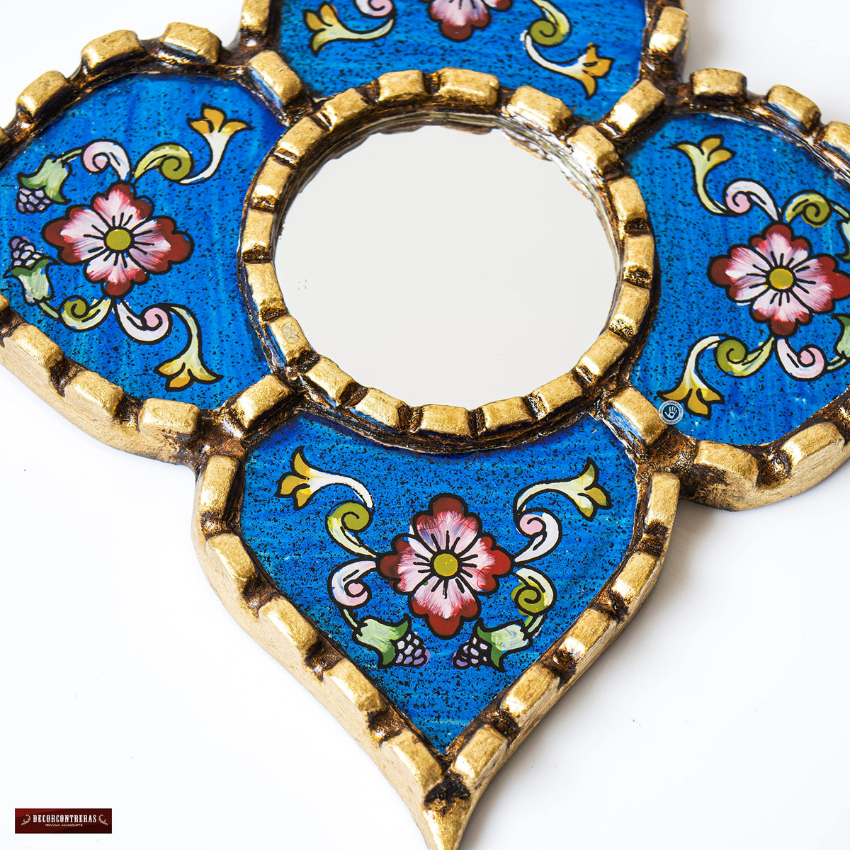 DecorContreras Artisan Small Decorative Mirror detail of bronze leaf border