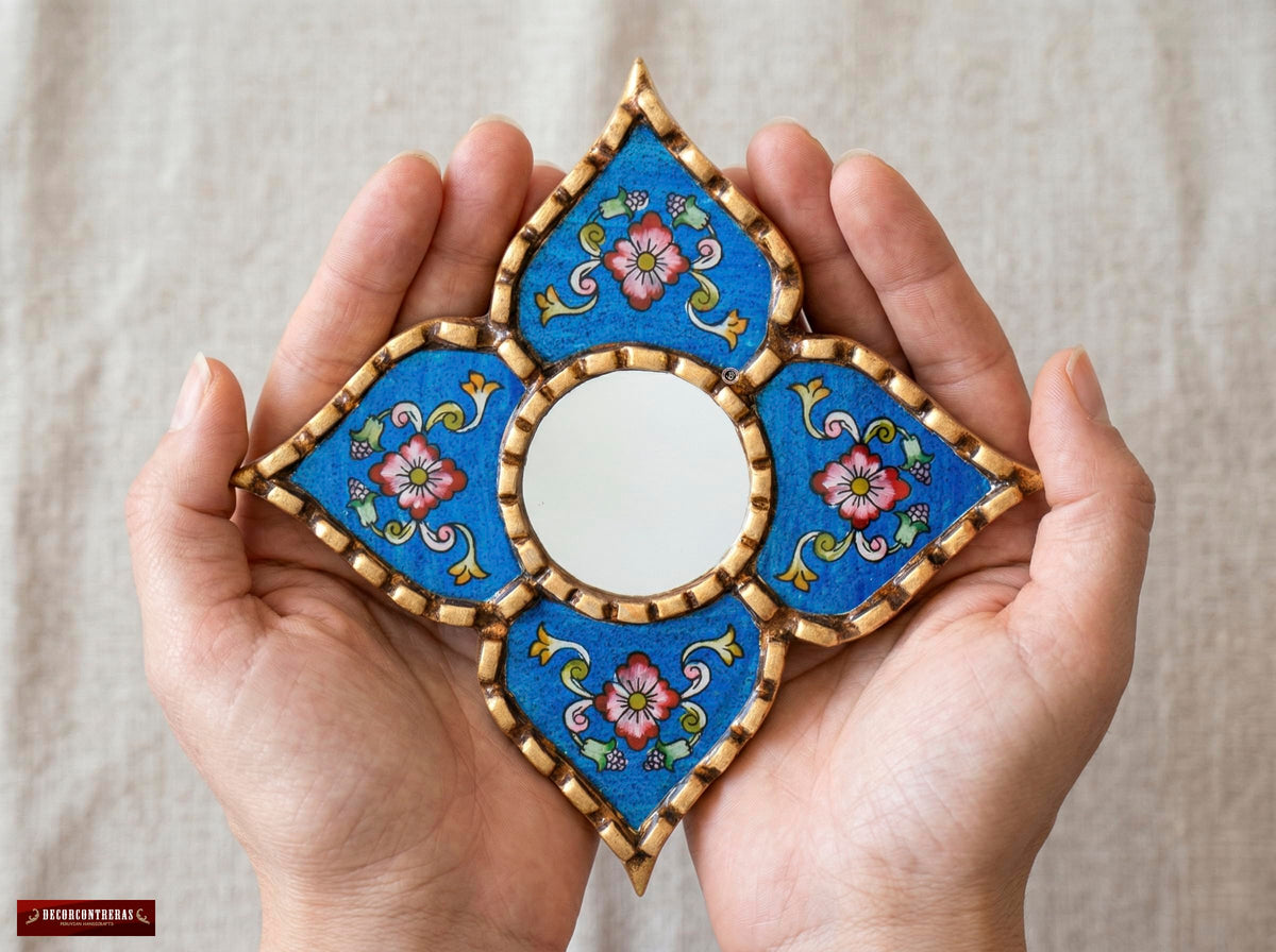 DecorContreras Artisan Small Decorative Mirror hanging on a wall