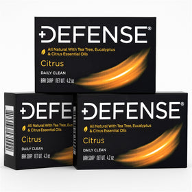 Defense Soap Citrus Bar with fresh citrus fruits