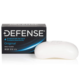 Defense Soap Tea Tree Bar Soap stacked in a bathroom