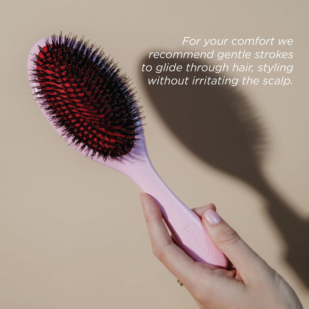 Denman Boar Bristle Hair Brush in lifestyle setting