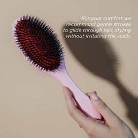 Denman Boar Bristle Hair Brush in lifestyle setting