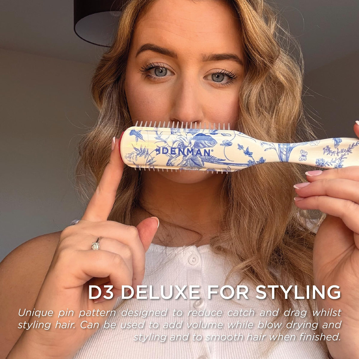 Denman D3 Curly Hair Brush in use on curly hair