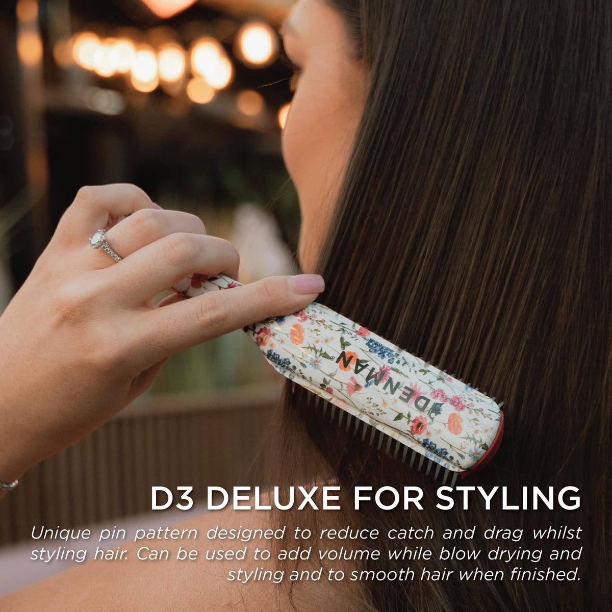 Denman D3 Curly Hair Brush in use on curly hair