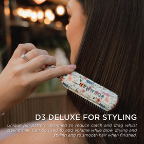 Denman D3 Curly Hair Brush in use on curly hair