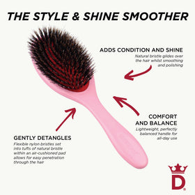 Denman hairbrush on vanity with hair products