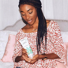 Derma E Vitamin E lotion being applied to dry skin