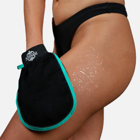 Dermasuri Exfoliating Body Scrubber Glove in use during shower
