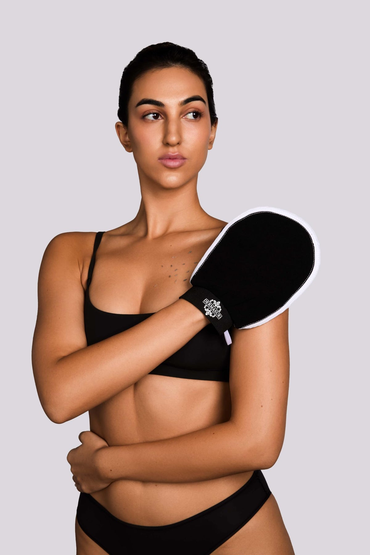Dermasuri Exfoliating Body Scrubber Glove XL in use during a shower