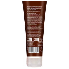 Desert Essence Coconut Conditioner applied to hair