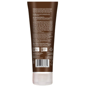 Desert Essence Coconut Shampoo pouring into hand