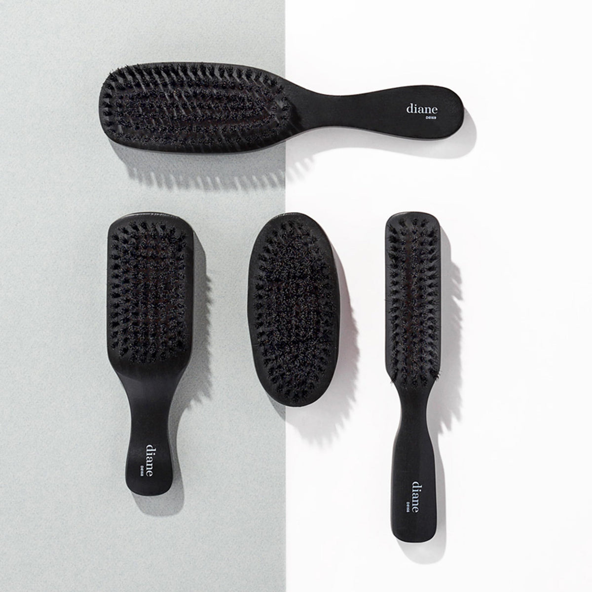 Diane Boar Bristle Military Brush in use on wavy hair