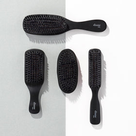 Diane Boar Bristle Military Brush in use on wavy hair