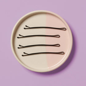 Diane bobby pins demonstrating secure hold in hair