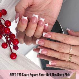 Different sizes of NOVO OVO nail tips arranged in a box