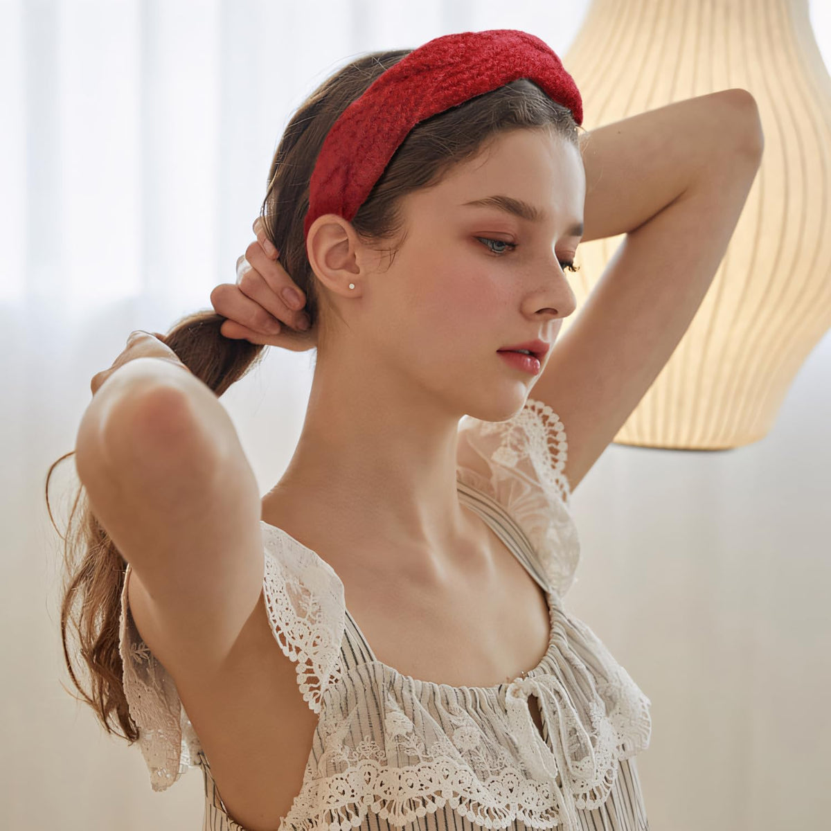 Different styles of red headbands laid out flat