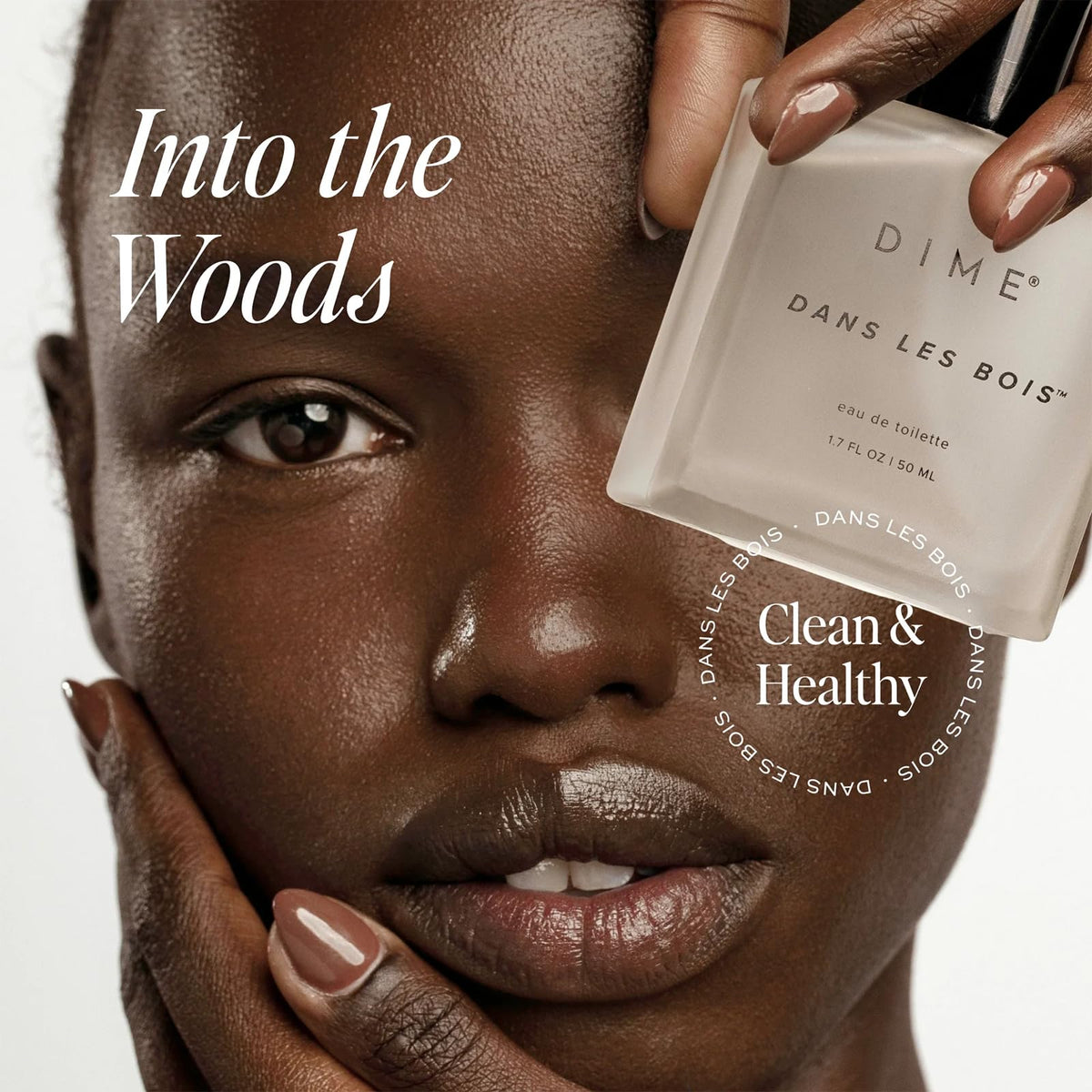 DIME Dans Les Bois Perfume spritzing on wrist