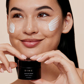 DIME Dewy Day Cream in a bathroom setting