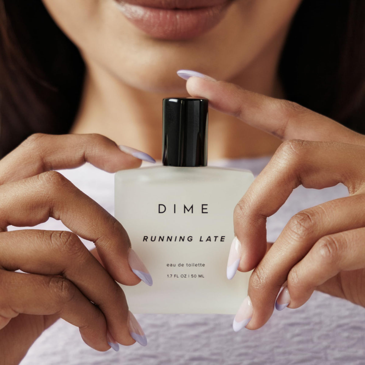DIME Running Late Perfume 1.7 oz packaging with branding